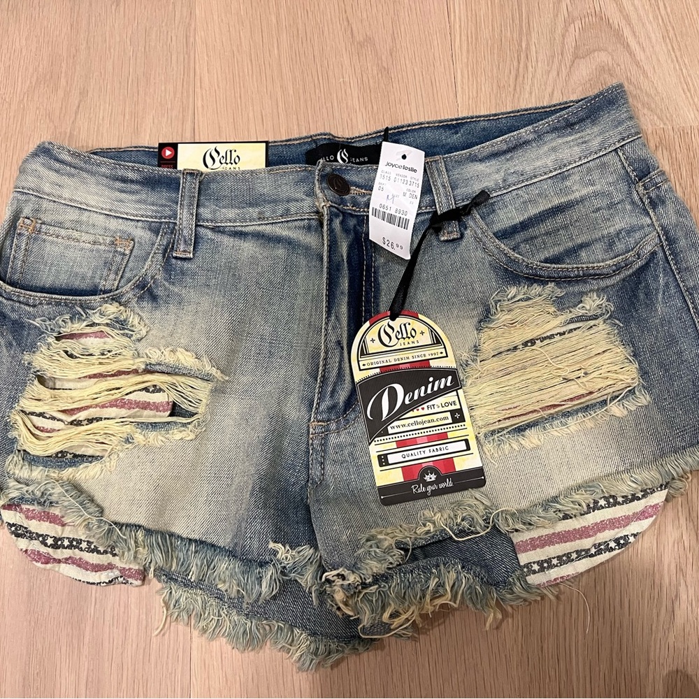 Never worn- Denim shorts w/American flag pockets